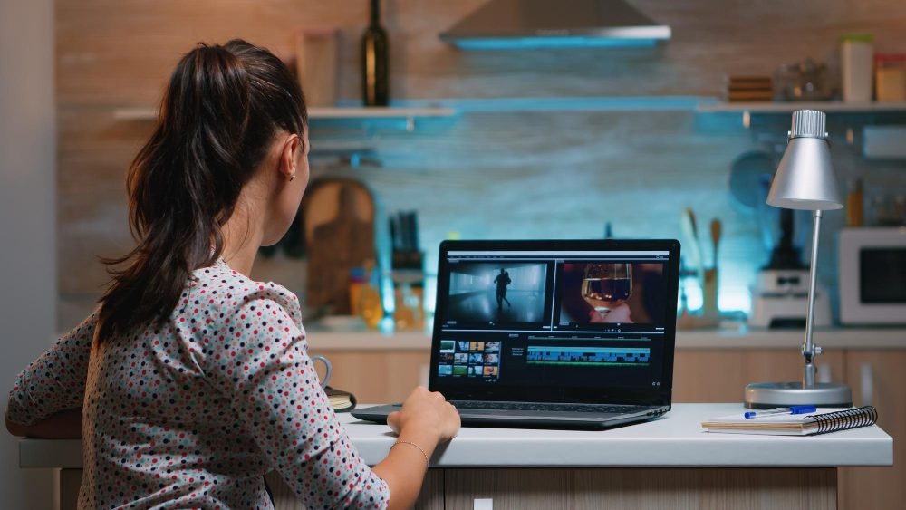 video-editor-working-from-home-night-new-project-editing-audio-film-montage-sitting-modern-kitchen-content-creator-using-professional-laptop-modern-technology-network-wireless